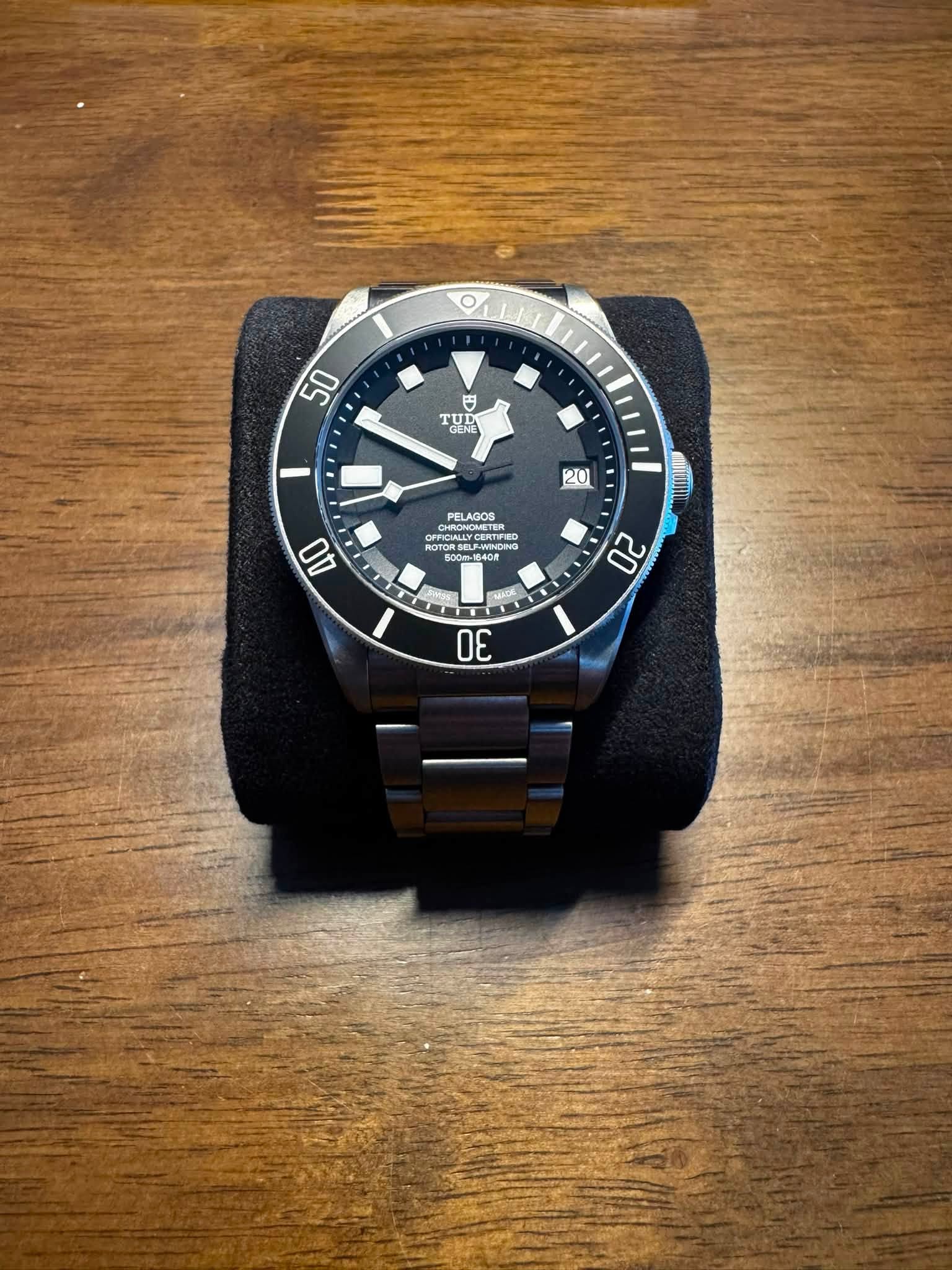 May be an image of wrist watch and text