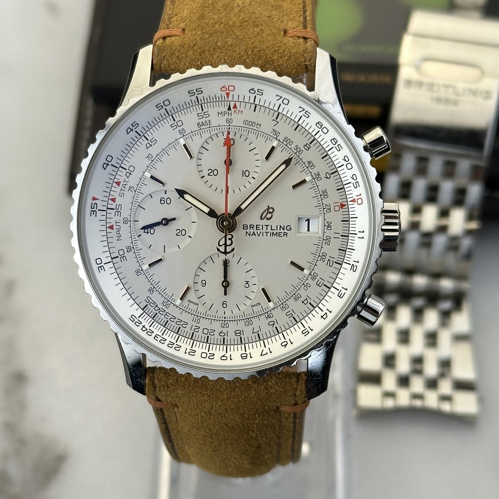 May be an image of wrist watch and text