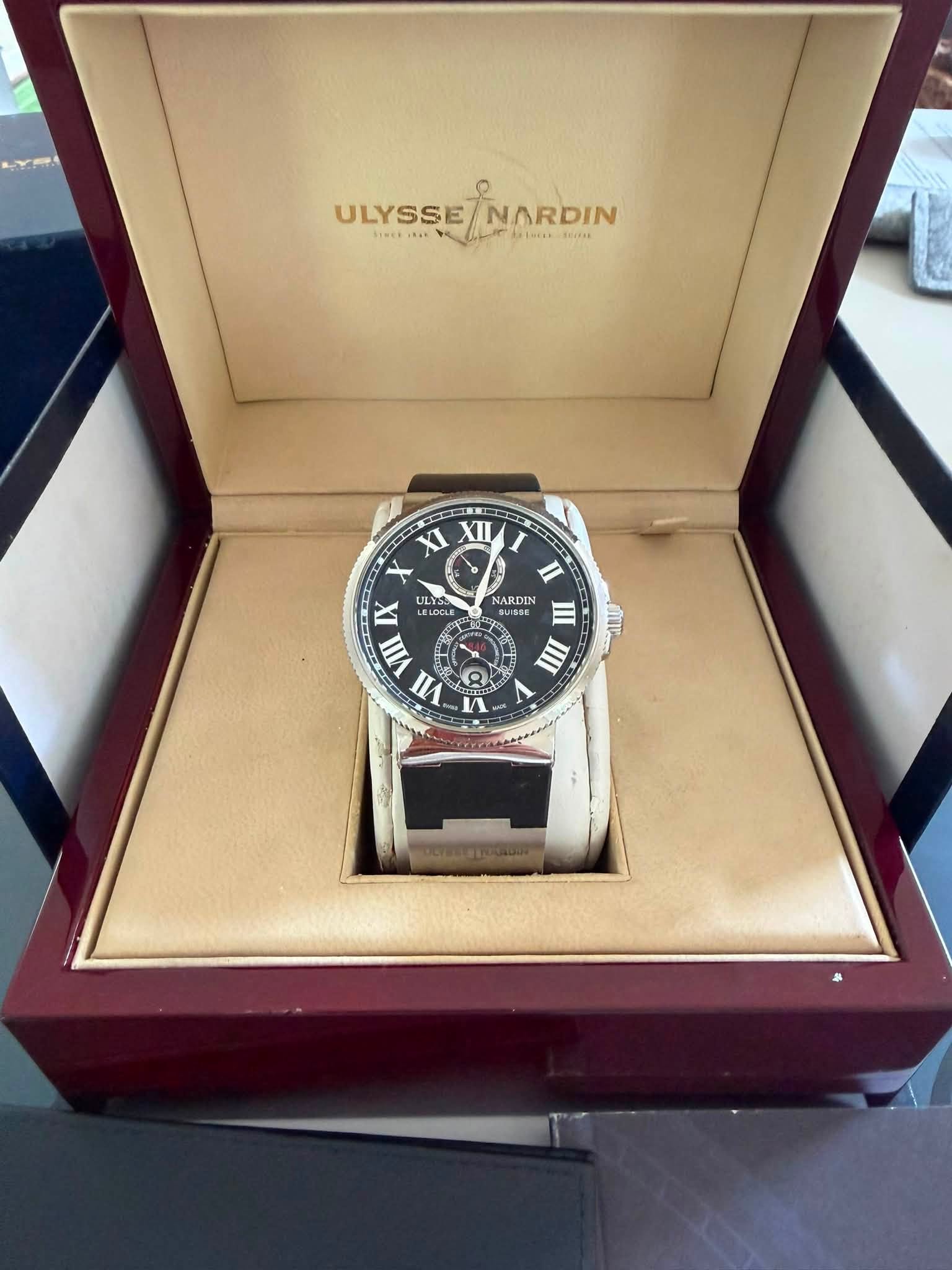 May be an image of wrist watch and text that says 'ULYSSE ULYSSE/NARDIN NARDIN m CIeEAs XI II H X IX ULIS LELDOLE NARDIN II III V VII A 1'