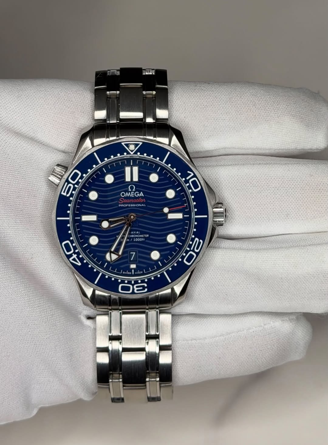 May be an image of wrist watch and text that says 'ーーマ 50 5 II ቤ OMEGA GA PROFESSIONAL PROFESS 10 AXIAL AXIAL ONCes . S 80'