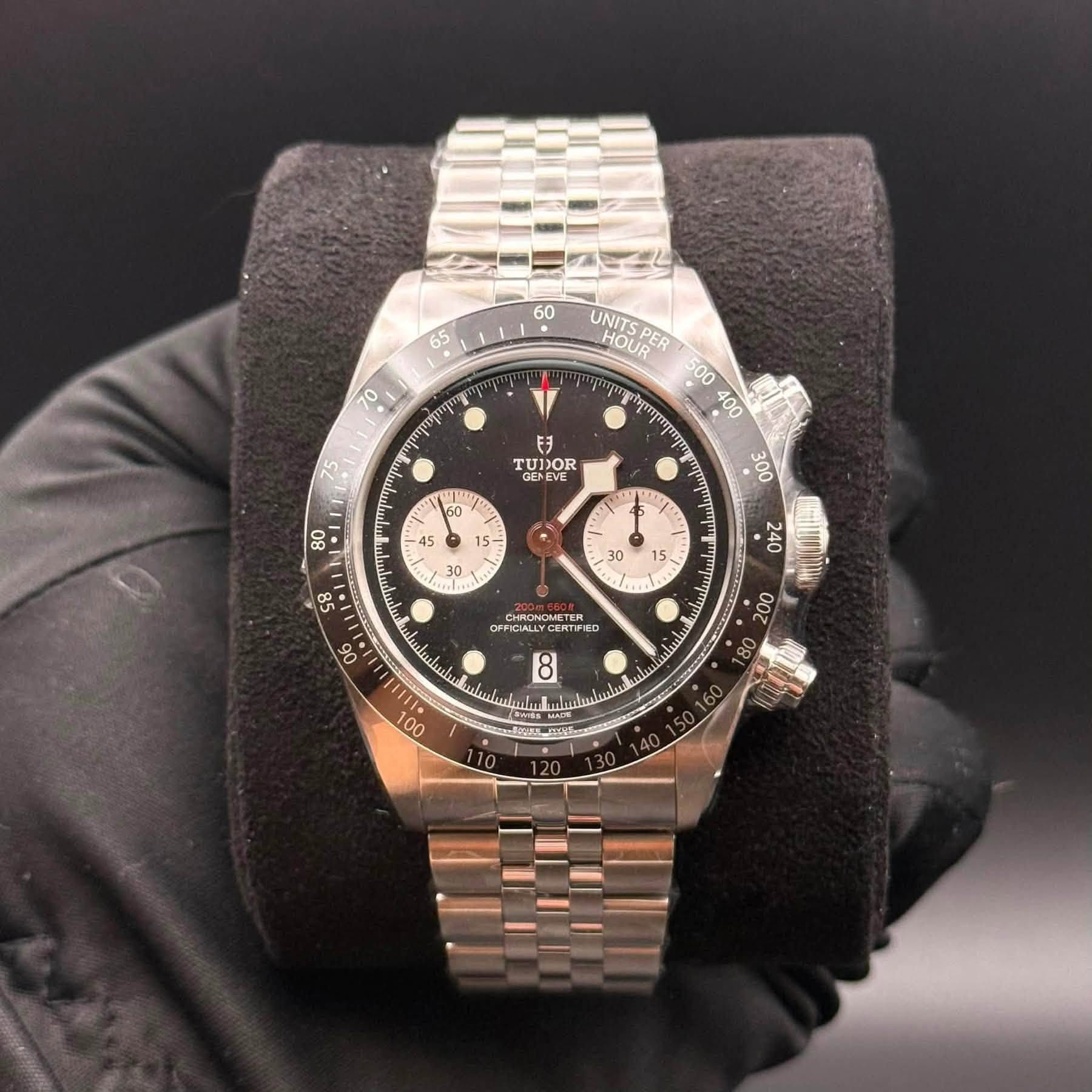 May be an image of wrist watch and text