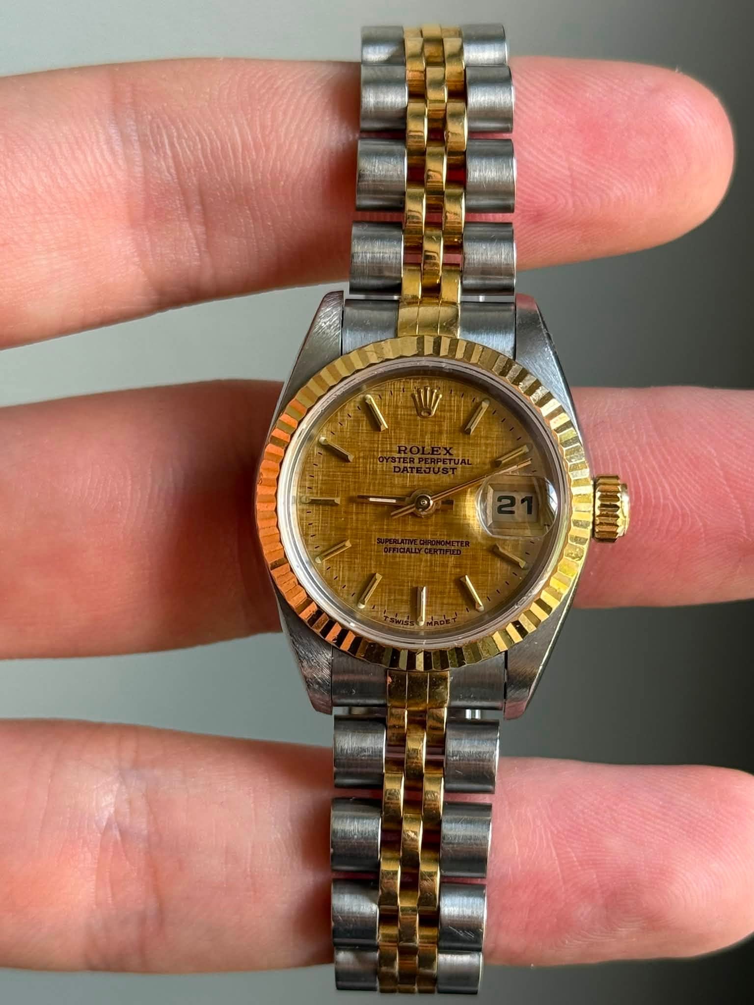 May be an image of wrist watch