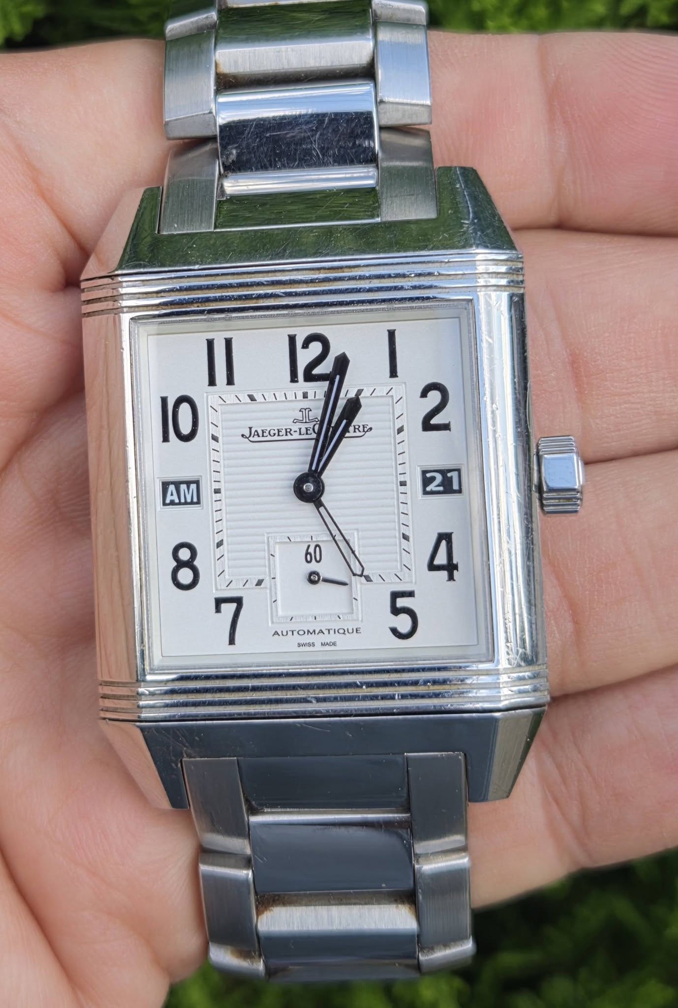 May be an image of digital watch and text