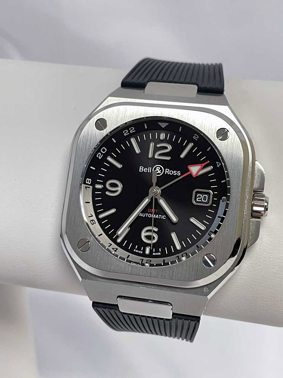 May be an image of digital watch and text that says ' Bell Ross Suy 9 20 L 9L AUT ΑΥΤΟΜΑ 6 WIes MADE'