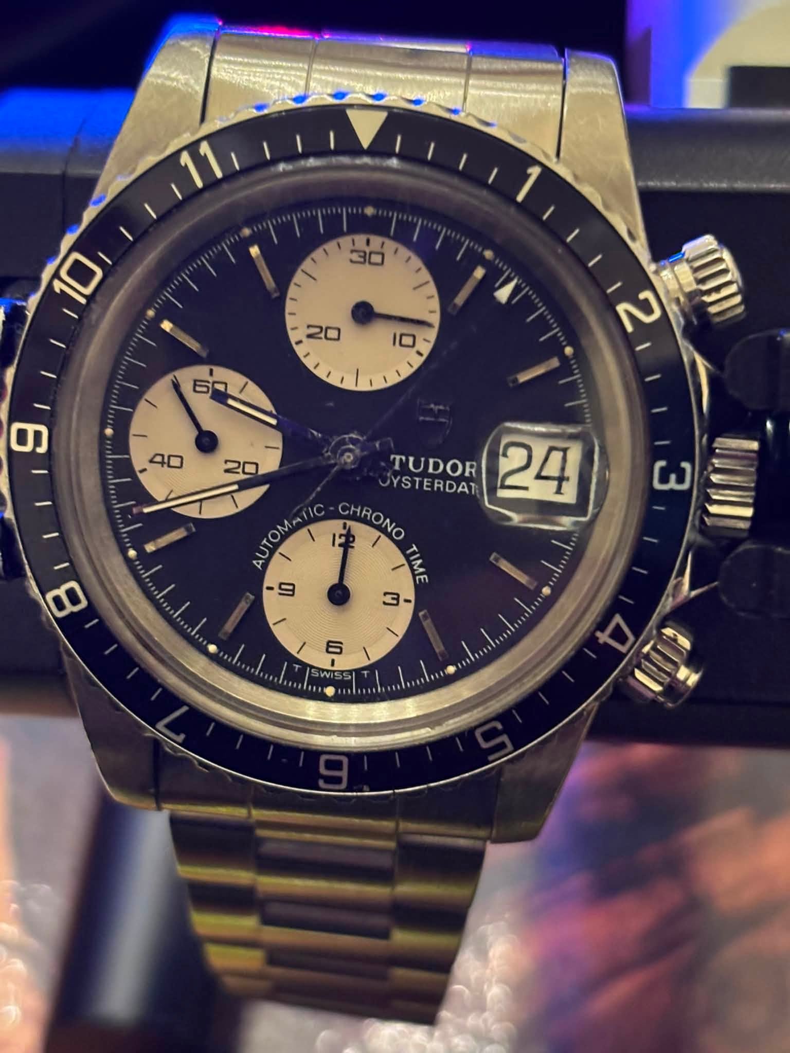 May be an image of wrist watch and text