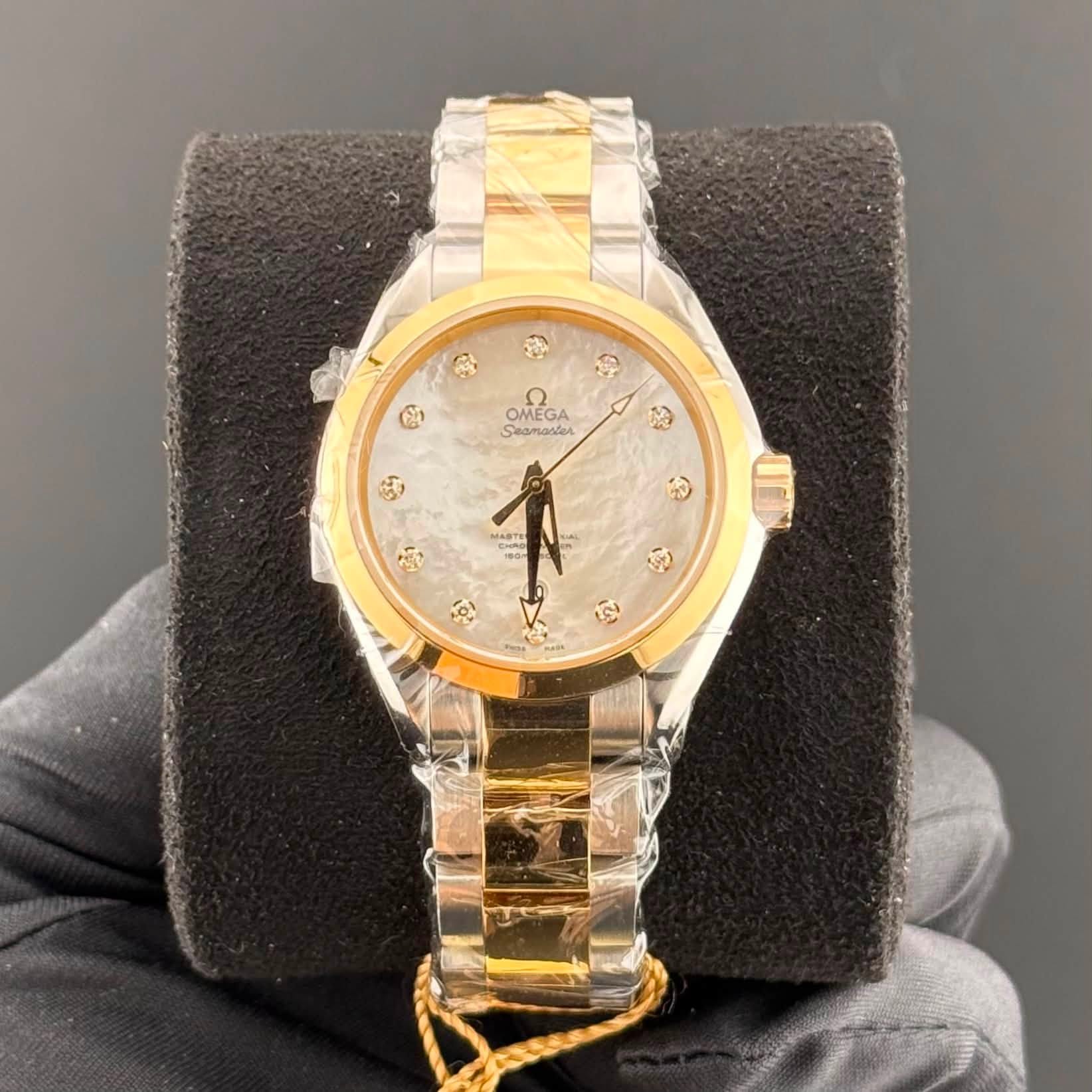 May be an image of wrist watch and text