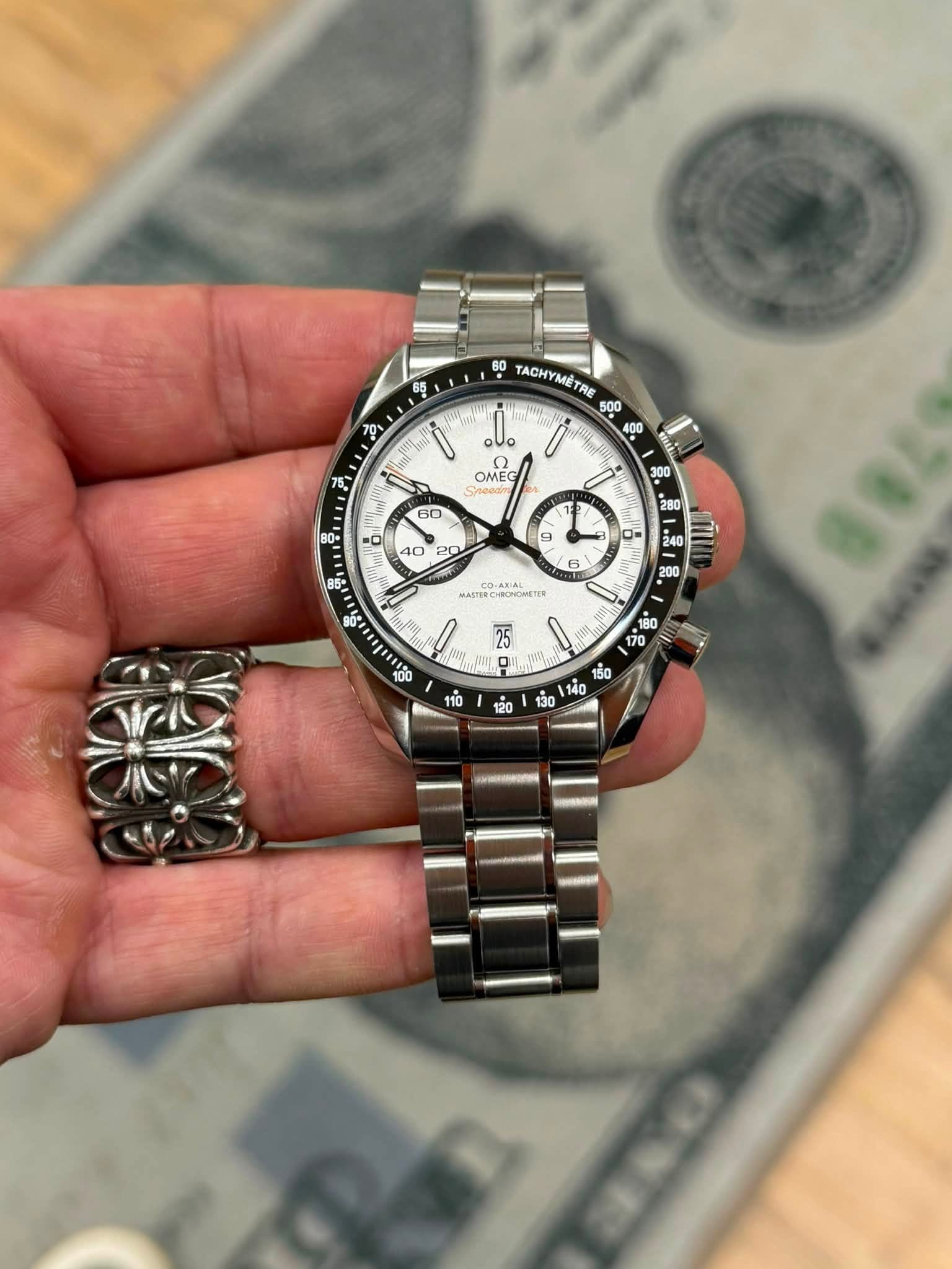 May be an image of wrist watch and text