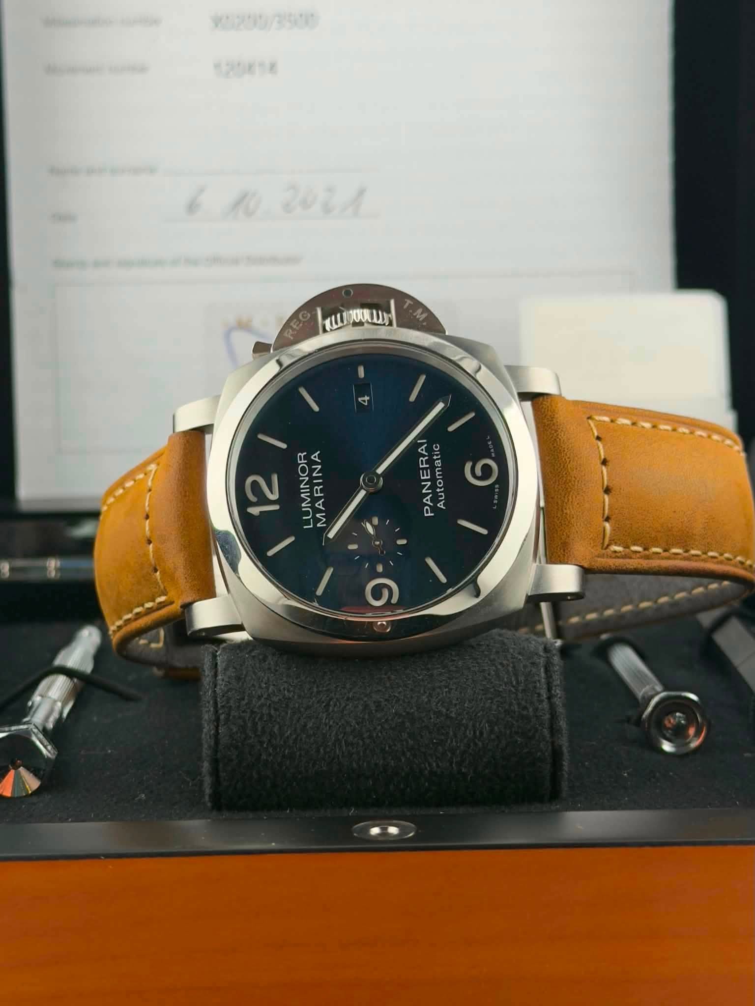 May be an image of wrist watch and text