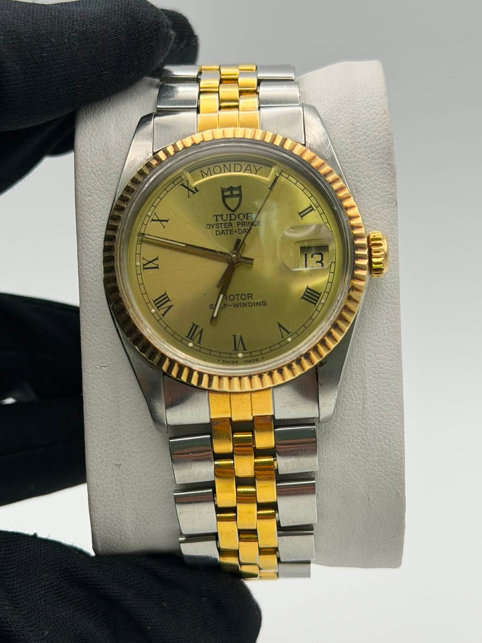May be an image of wrist watch and text