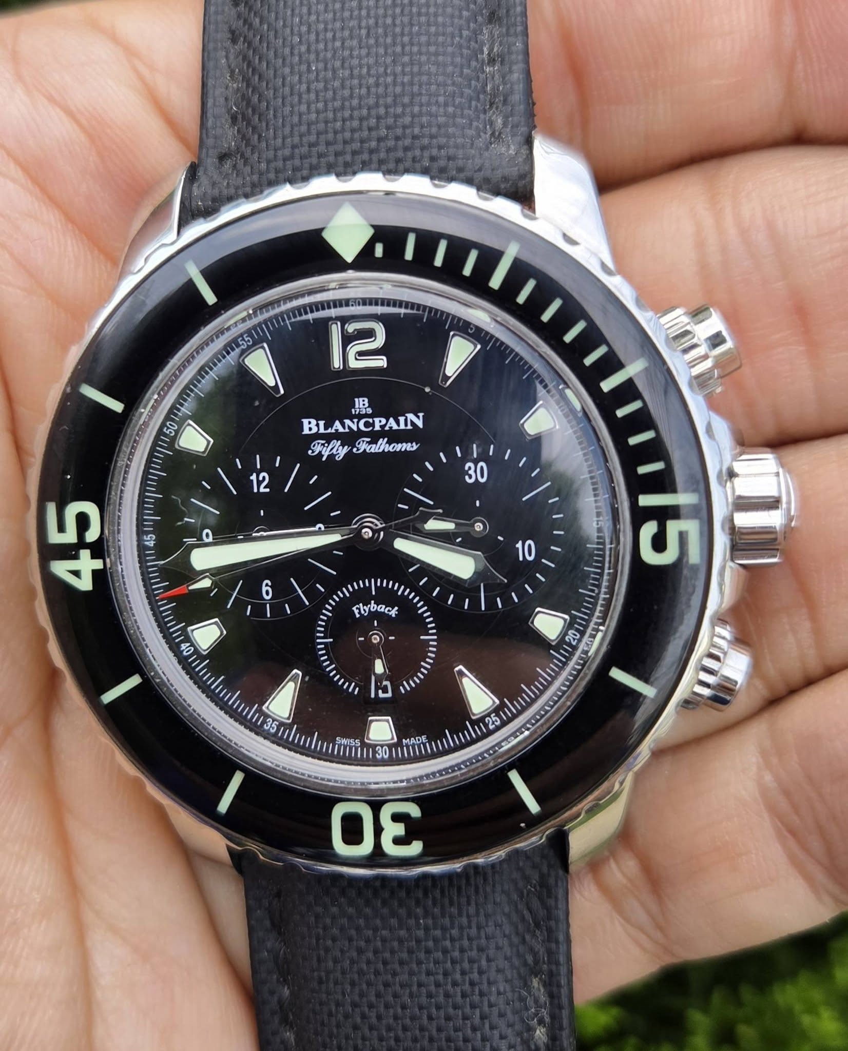 May be an image of wrist watch and text that says 'የትስሞጣ 55 50 12 V 用 BL BLANCPAIN 10 FiflyFalhom Fifly Falhoms Q pηиuи 6 10 Flyback 00 ቤና 人 ၁ ודם E แทน م3'