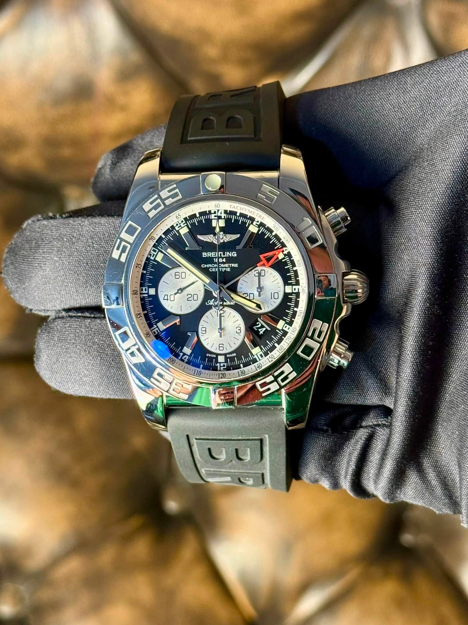 May be an image of wrist watch and text