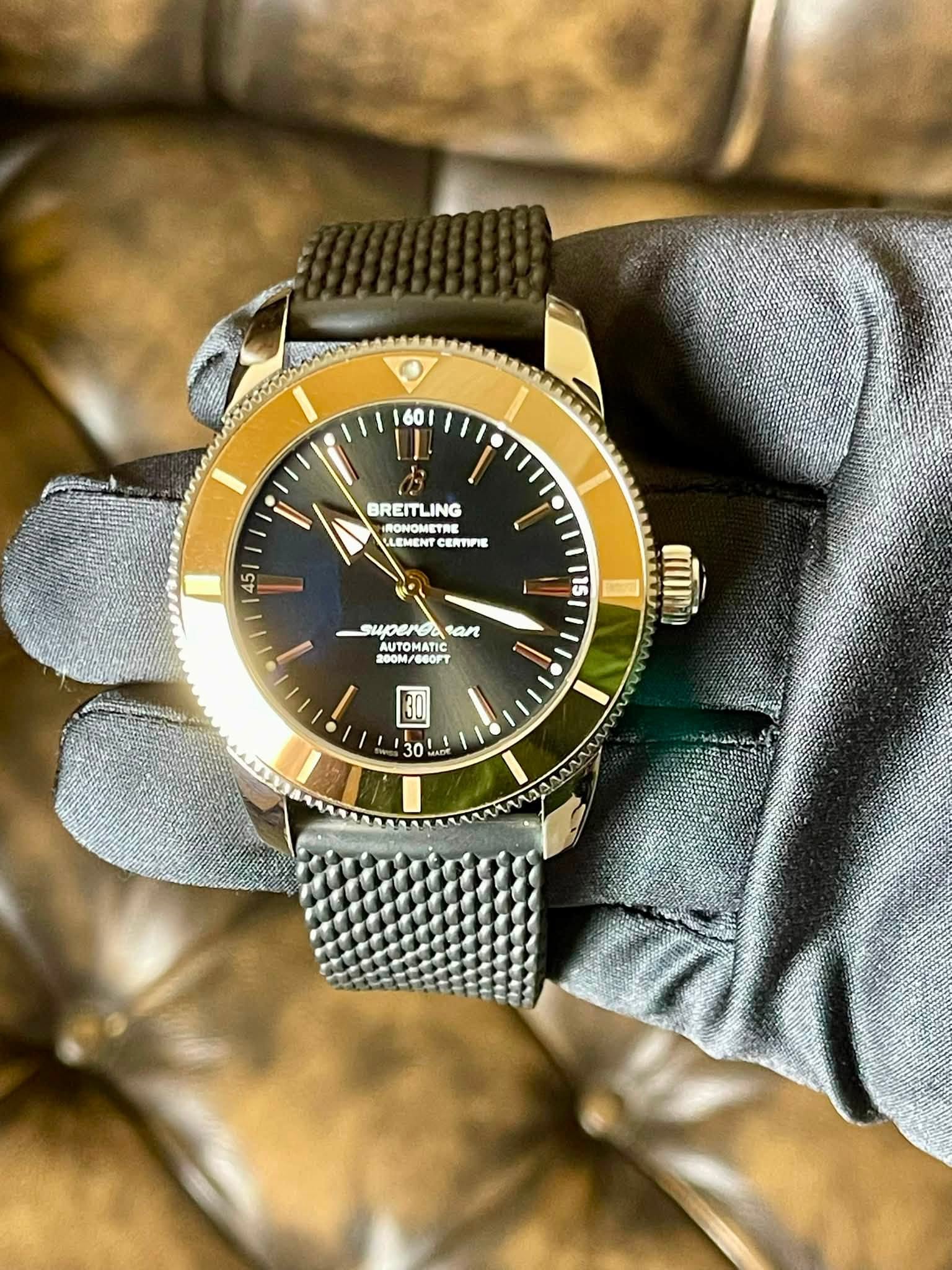 May be an image of wrist watch and text