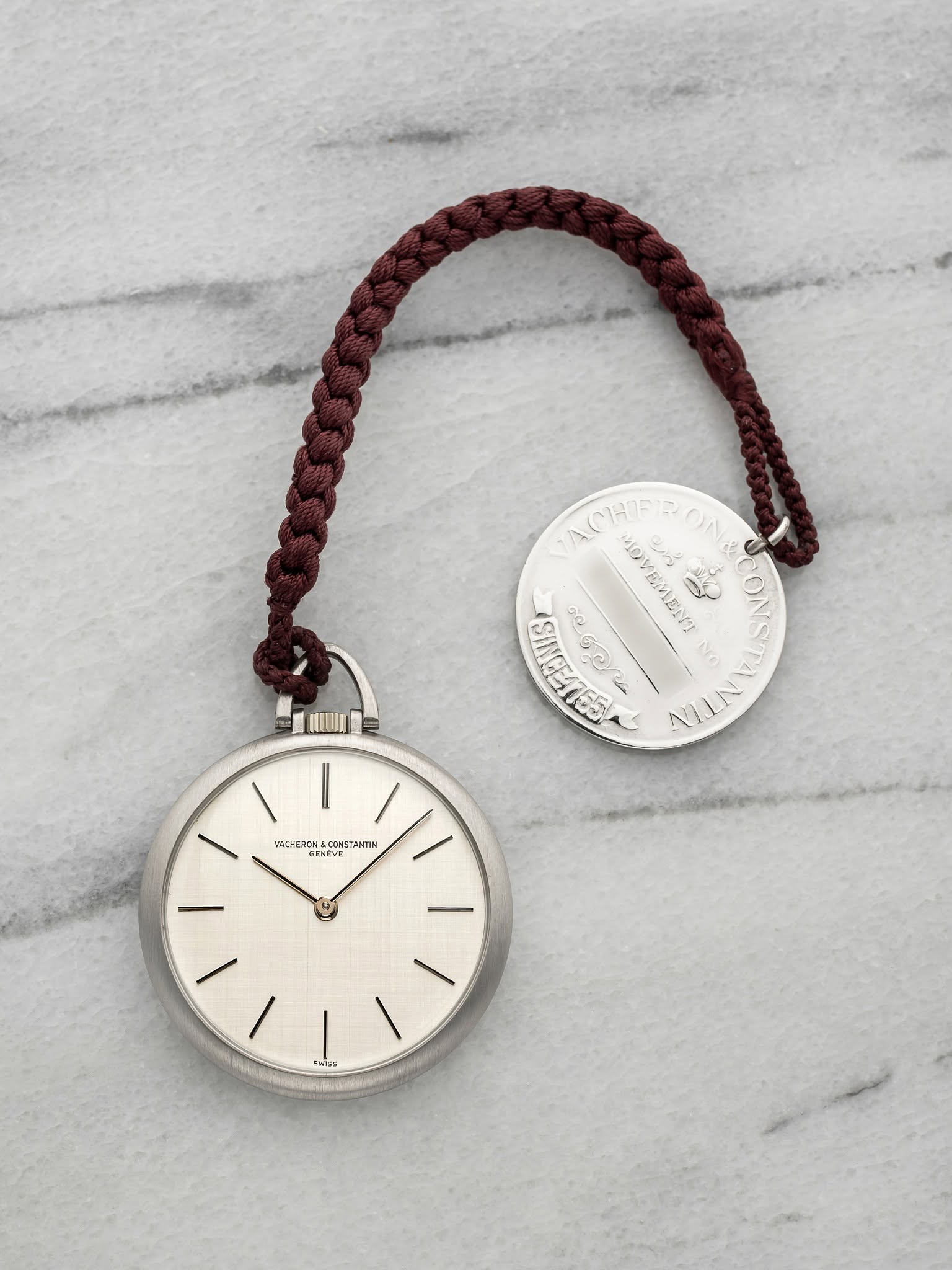 May be an image of wrist watch, jewelry and text
