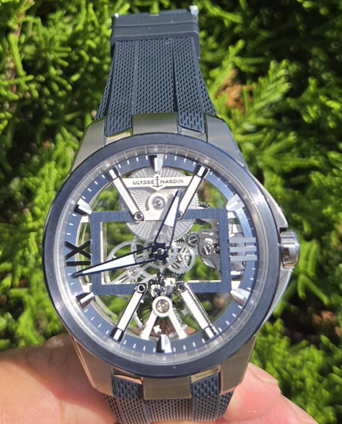 May be an image of wrist watch and text