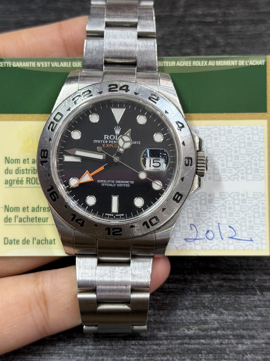 May be an image of text that says 'ETTE GARANTIE ETEGARANTIEN'ESTVALABLEQUE N'EST VALABLE QUE BUTEURAGREROLEXAUMOMENTDEA BUTEUR AGREE ROLEX AU MOMENT DE L'ACHAT ROL RO OYSTE…