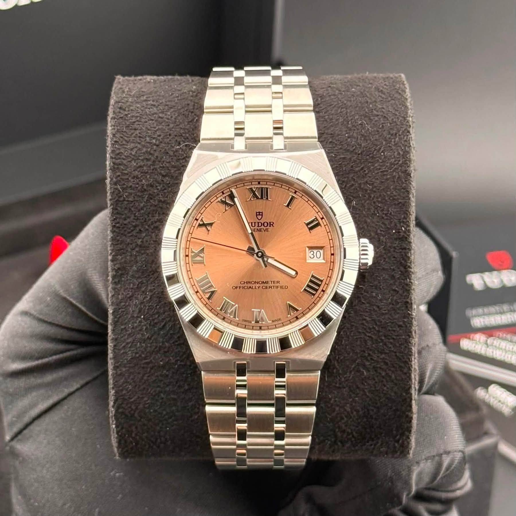 May be an image of wrist watch and text