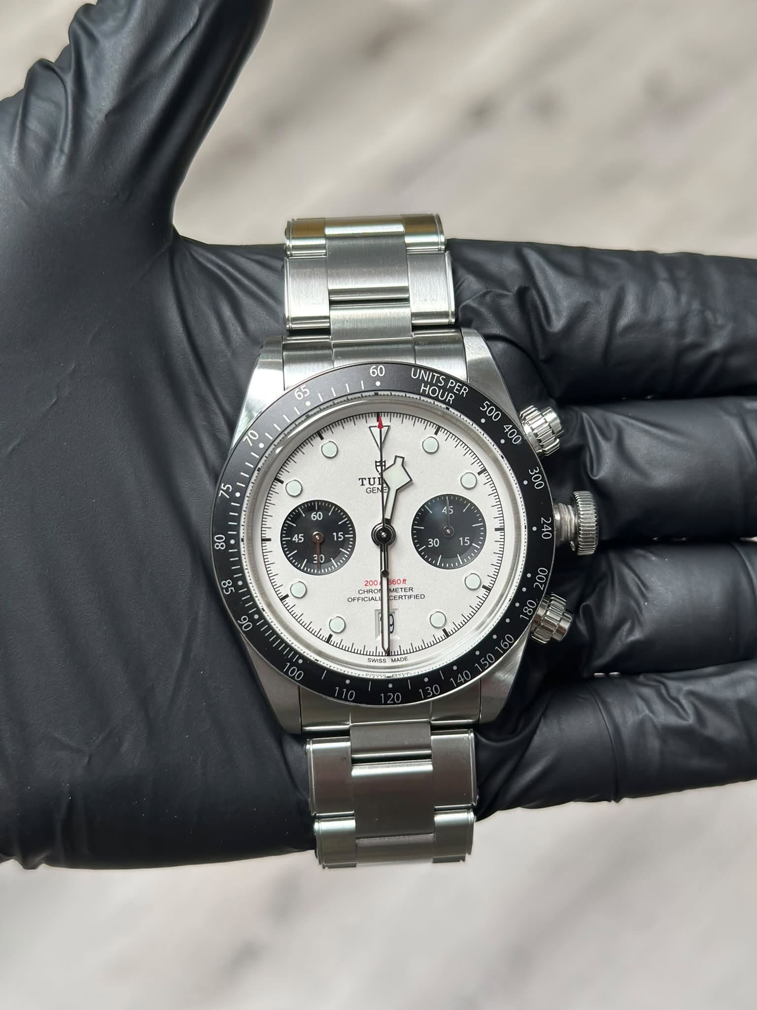May be an image of wrist watch and text
