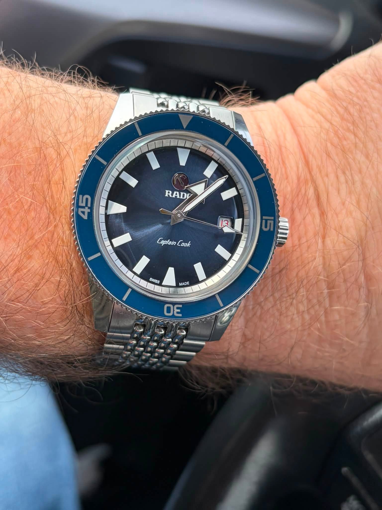 May be an image of wrist watch and text that says 'RADO 45 13 Capfain Look I 15 cUn SWISS MADE हা 30 二'
