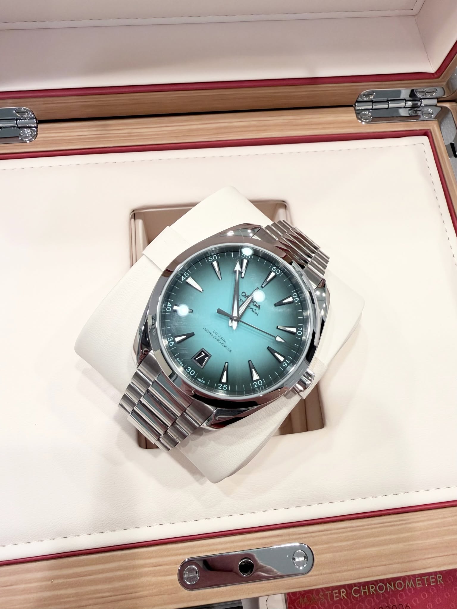 May be an image of wrist watch and text
