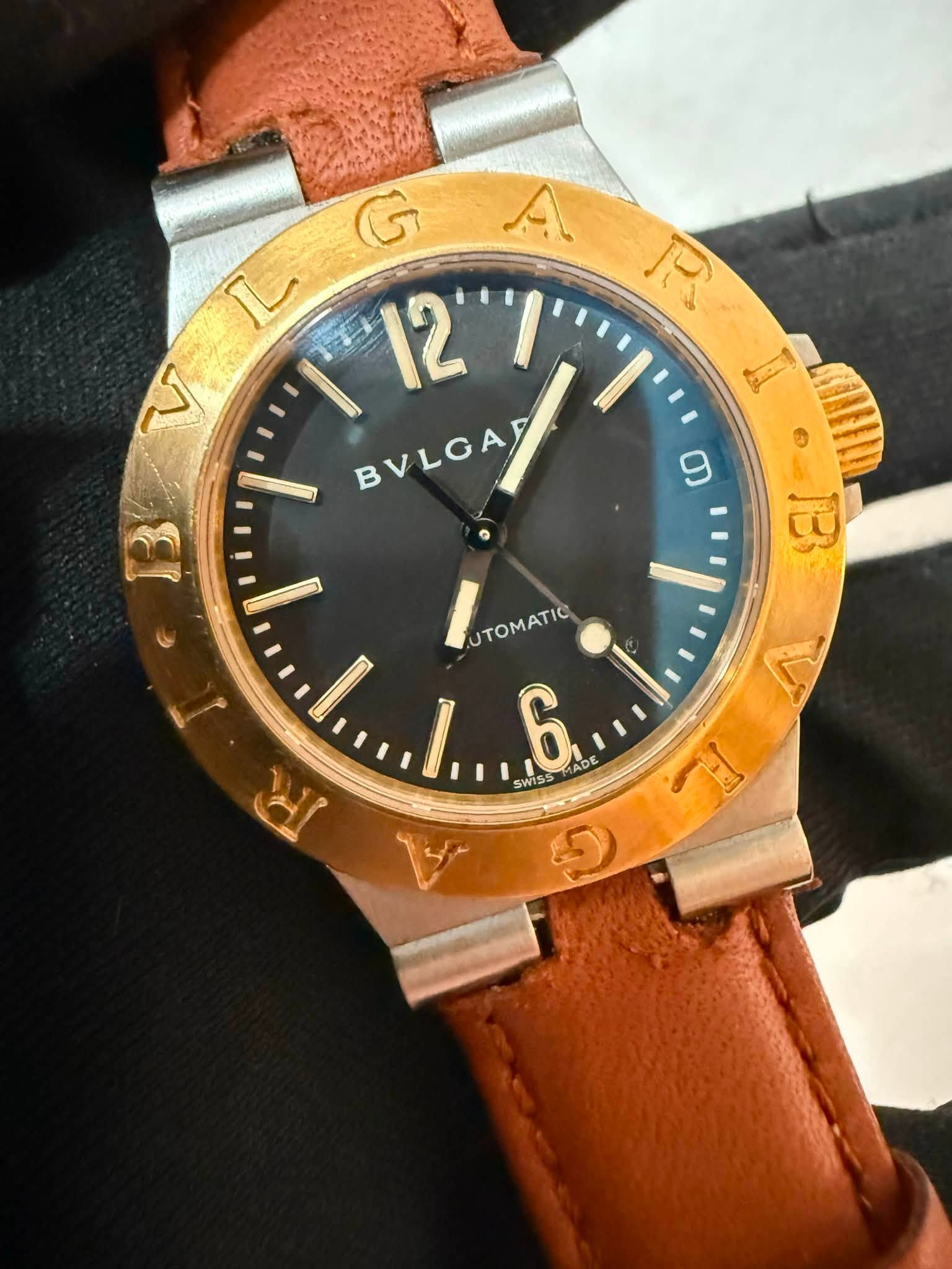 May be an image of wrist watch and text that says 'G L R 12' BVLOAY BVLGAD BVLGA BVLOAR B တ UTOMATIC UTOMATIC UTOMATIC 6 ADE SWISS सय Pa ទ م'