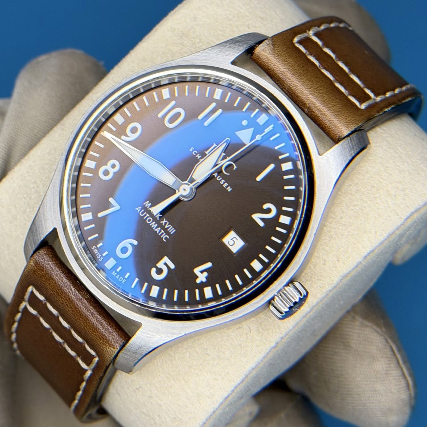 May be an image of wrist watch and text