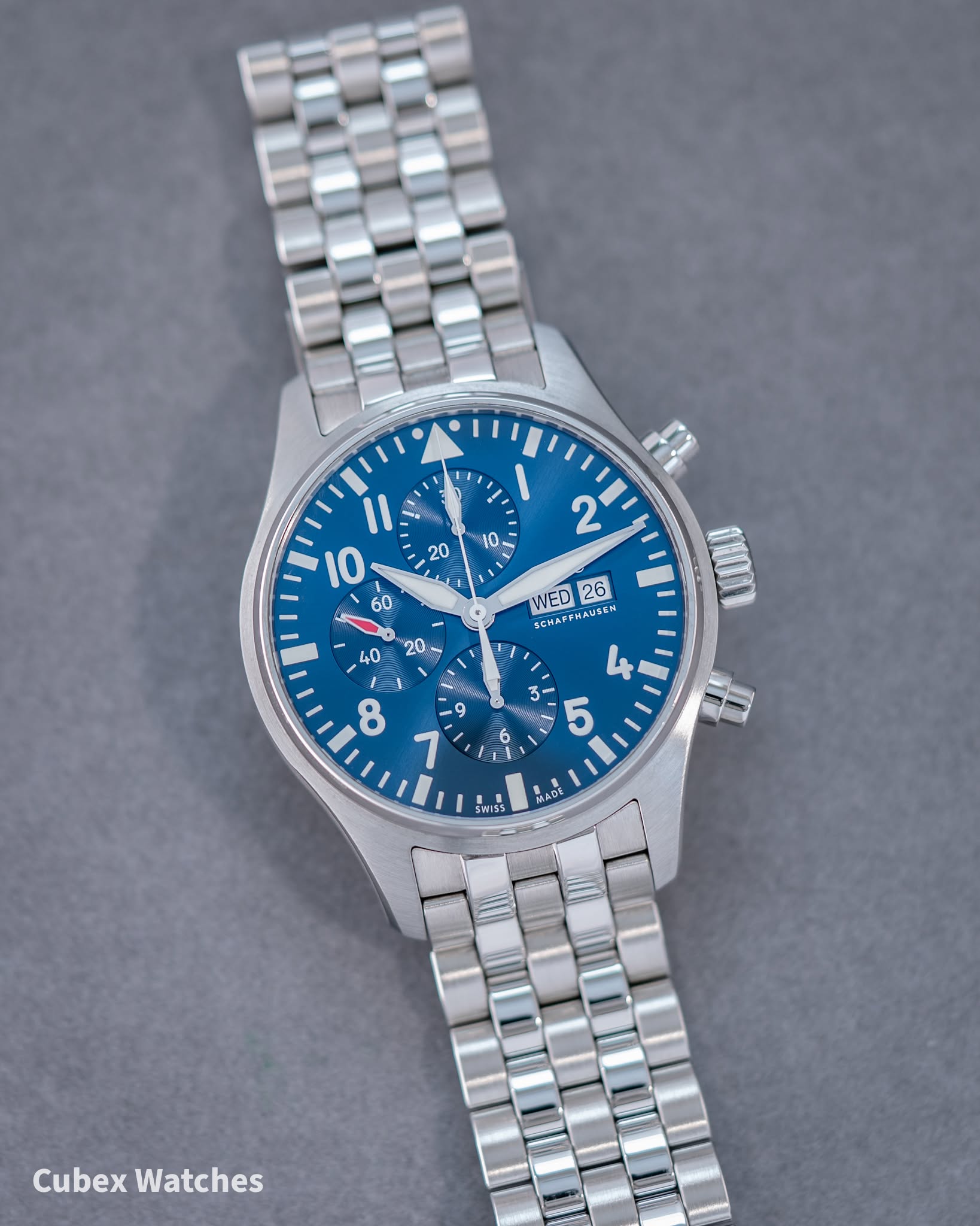 May be an image of wrist watch and text