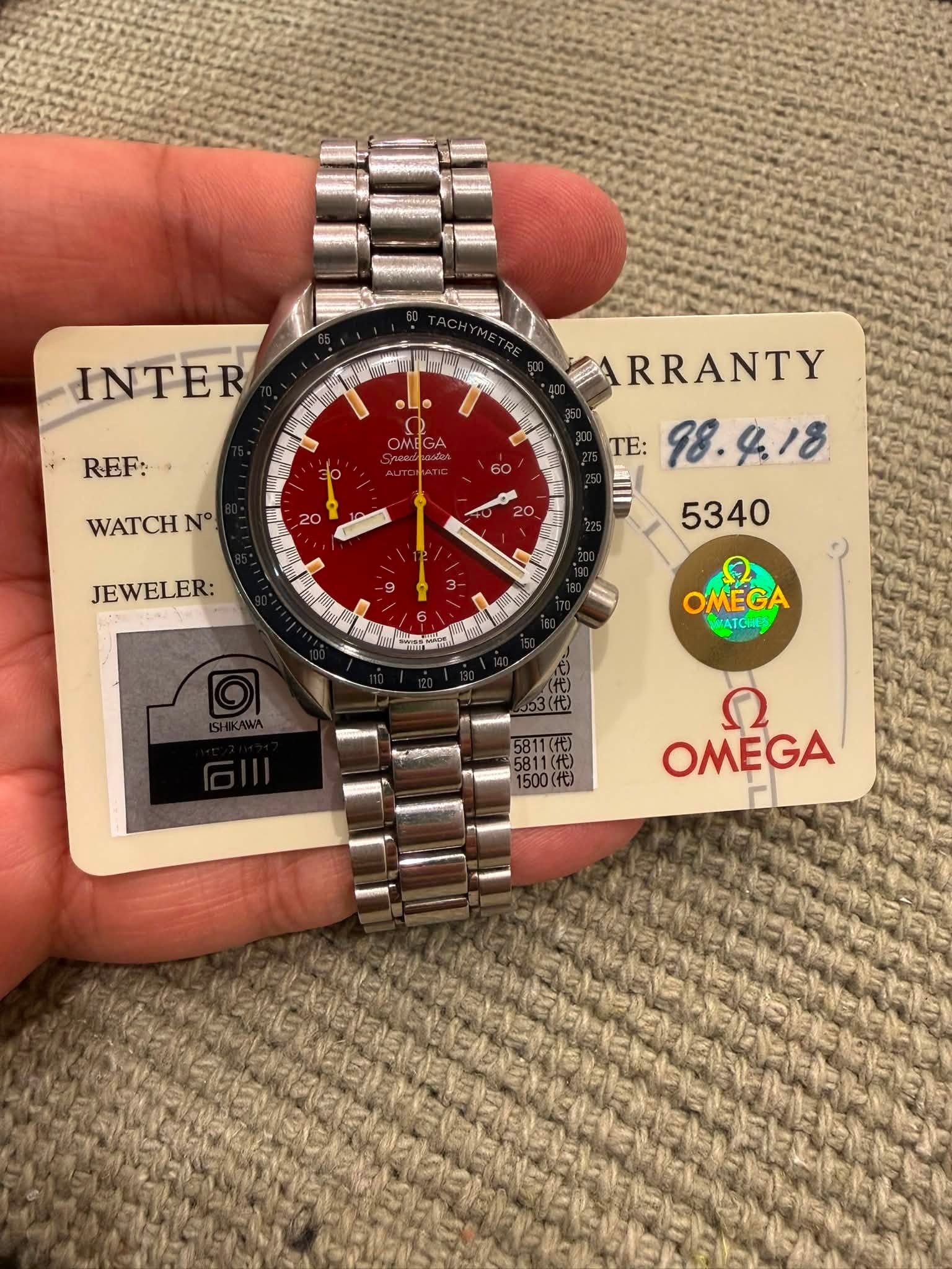 May be an image of wrist watch and text
