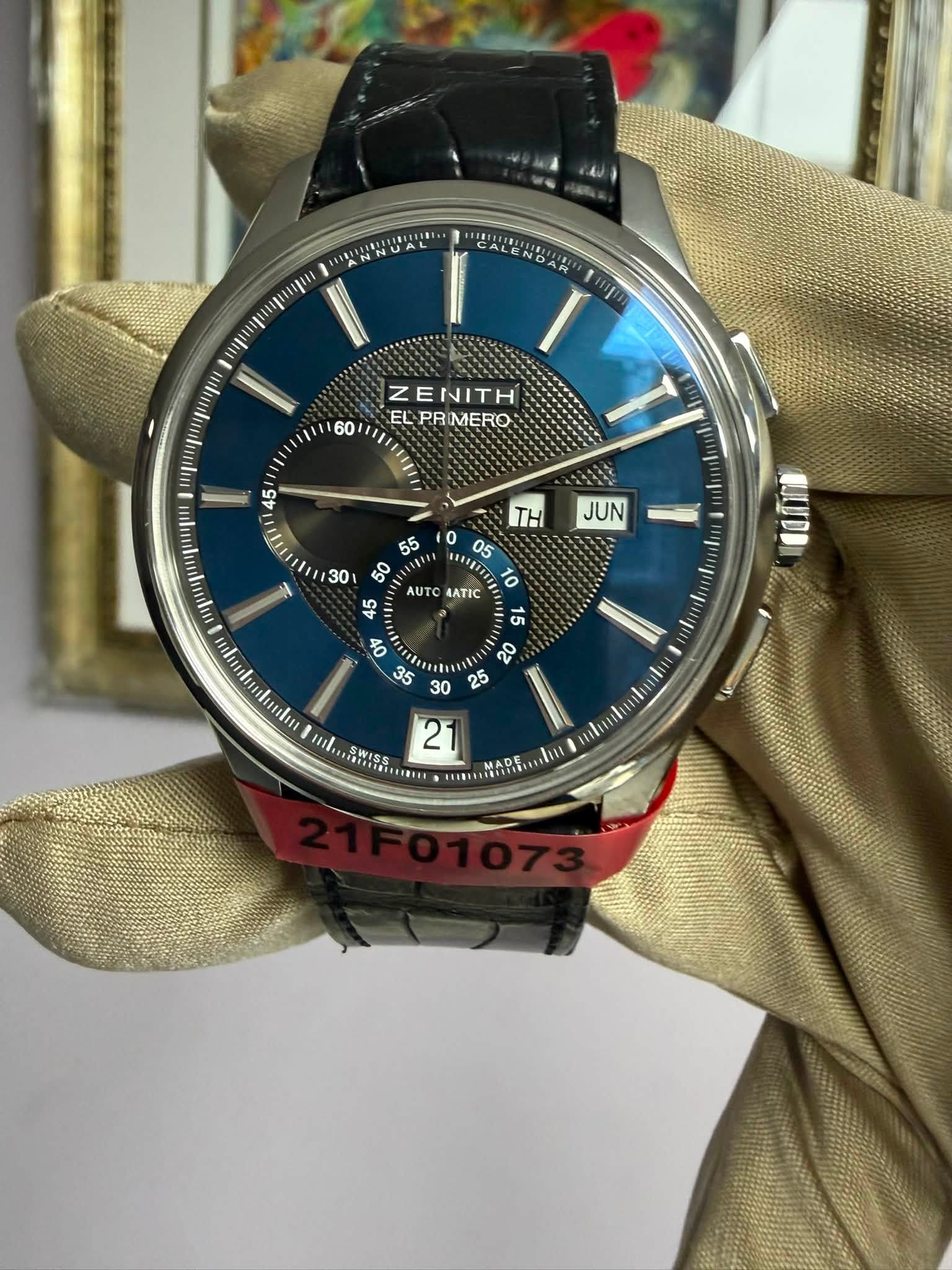 May be an image of wrist watch and text