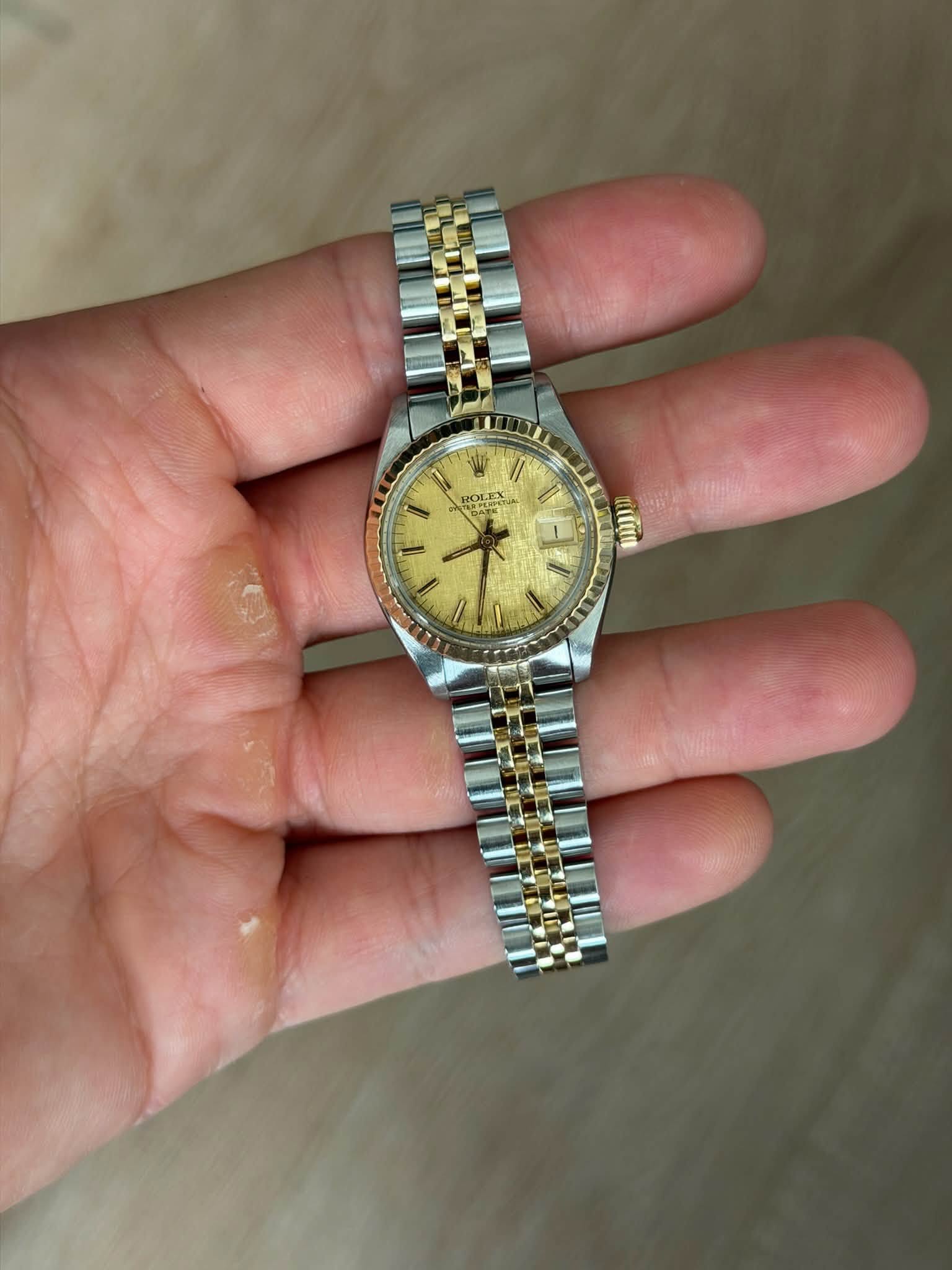 May be an image of wrist watch