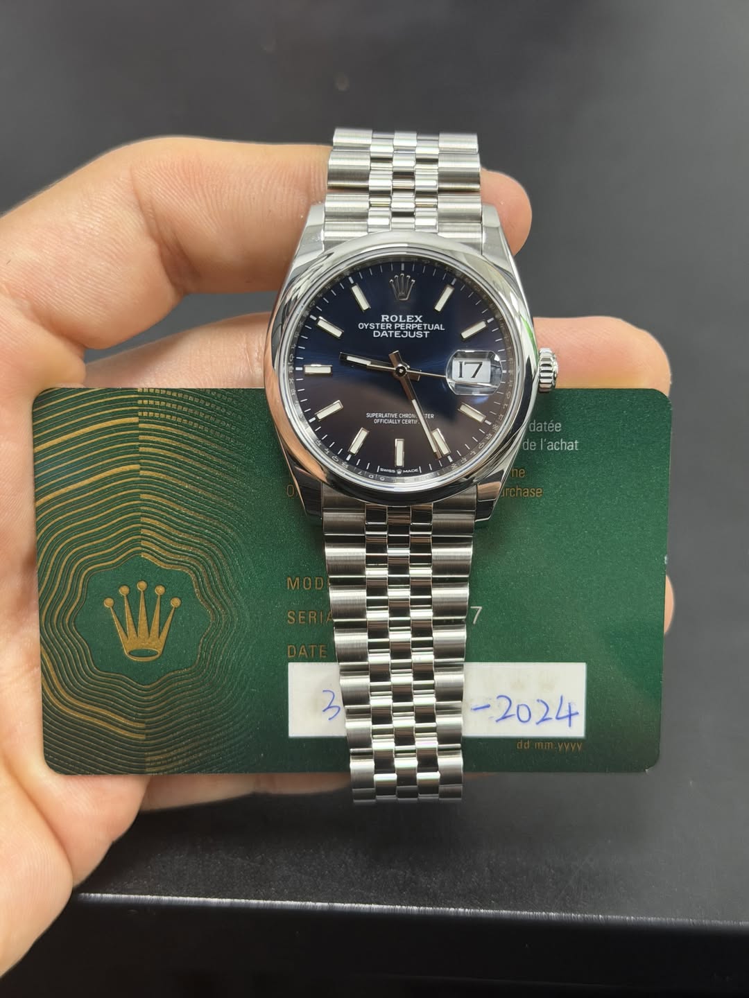 May be an image of wrist watch and text that says 'OYSTE ROLEXX X DA TLEX RPERPETL UAL AL EJUST STETA - 17 SPELATVED ഡ Fm datée 18 'achat 3 -2024'