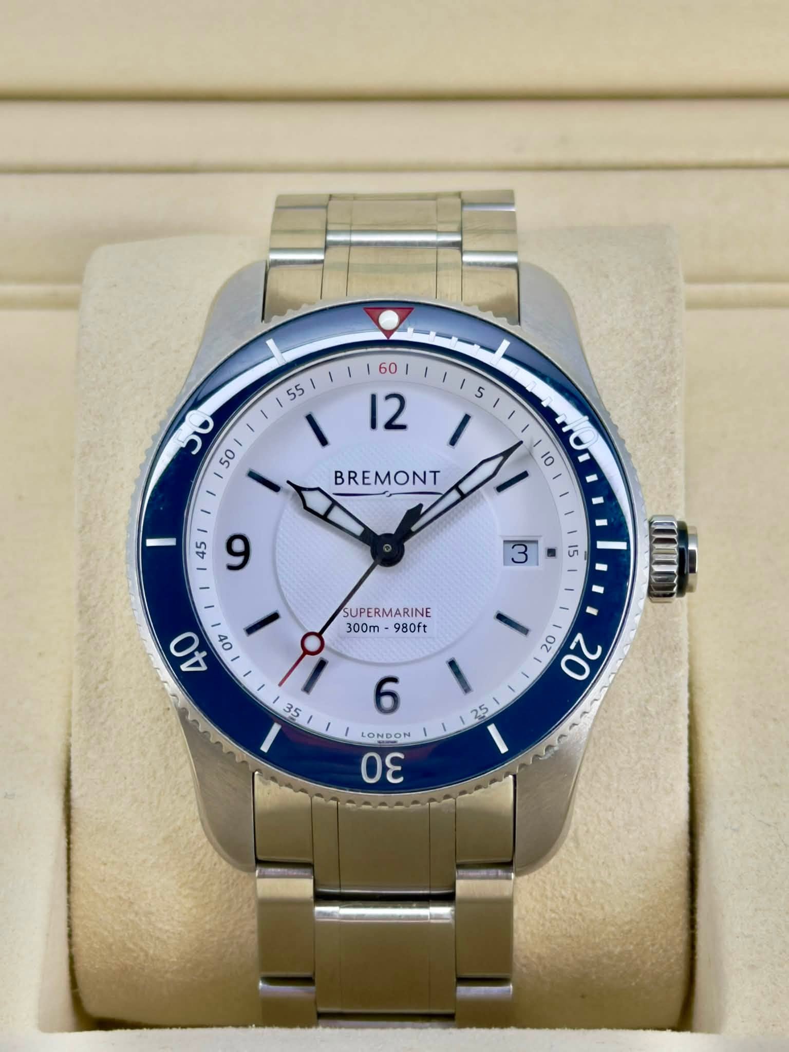 May be an image of wrist watch and text