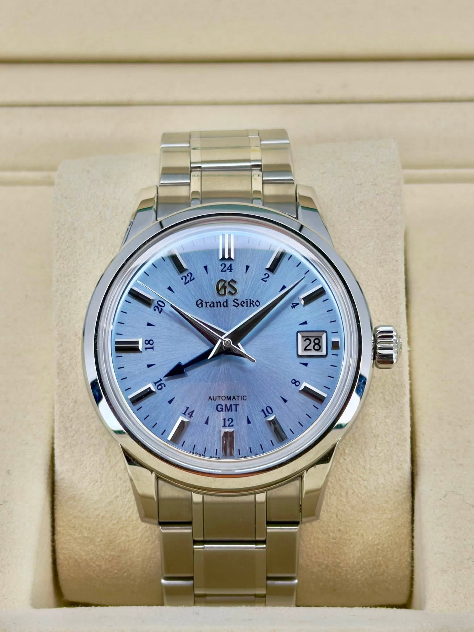 May be an image of wrist watch and text