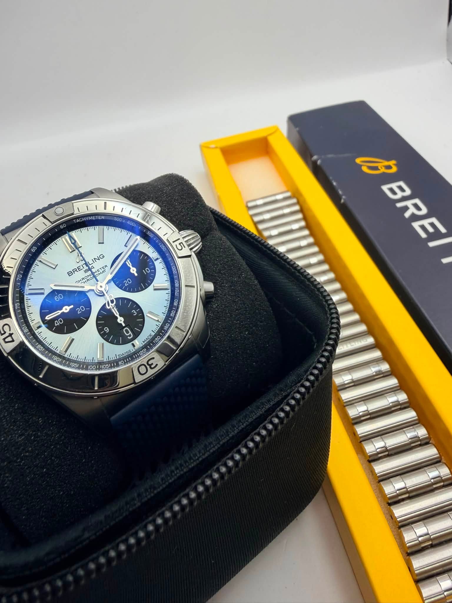 May be an image of wrist watch and text
