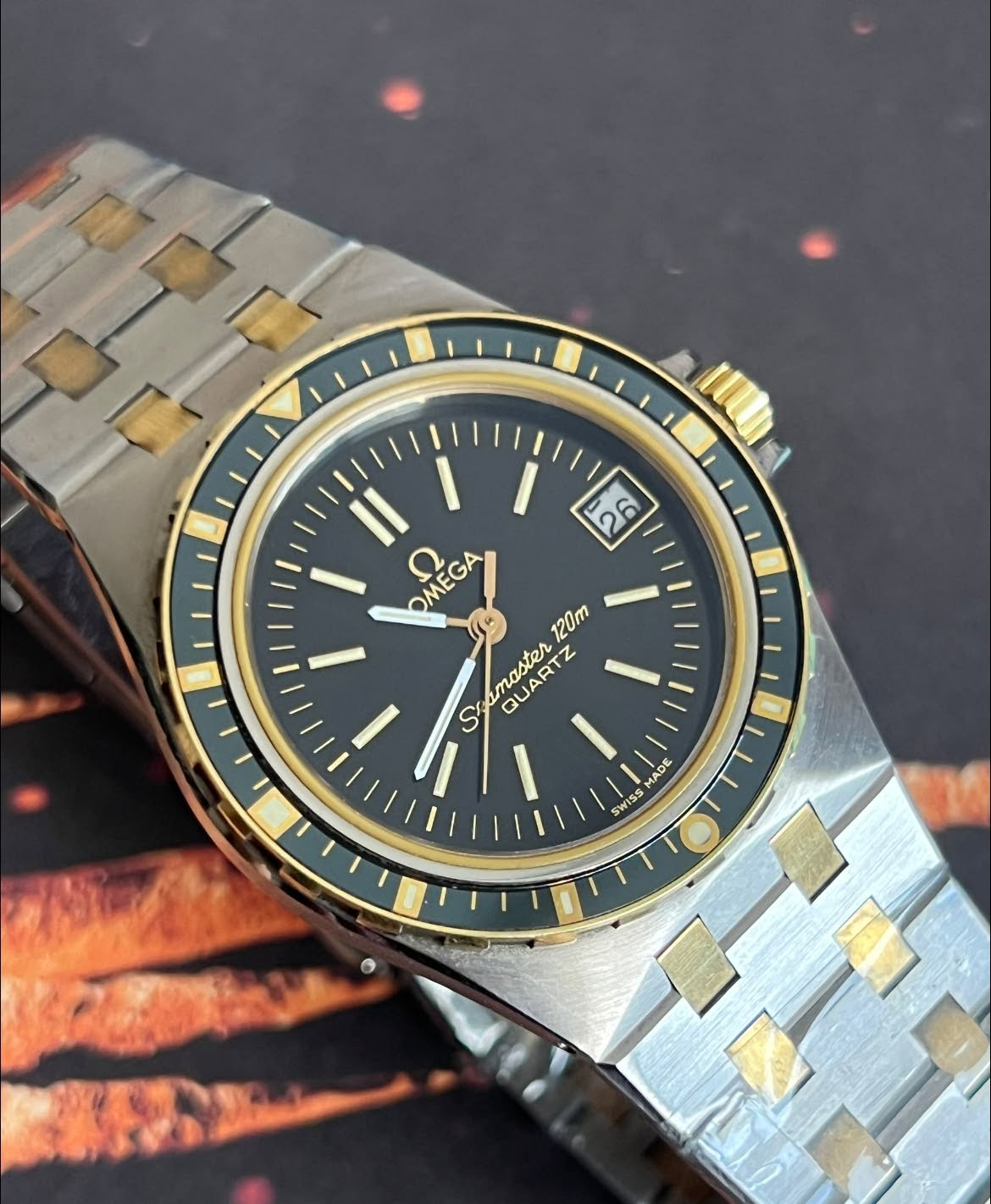 May be an image of wrist watch and text
