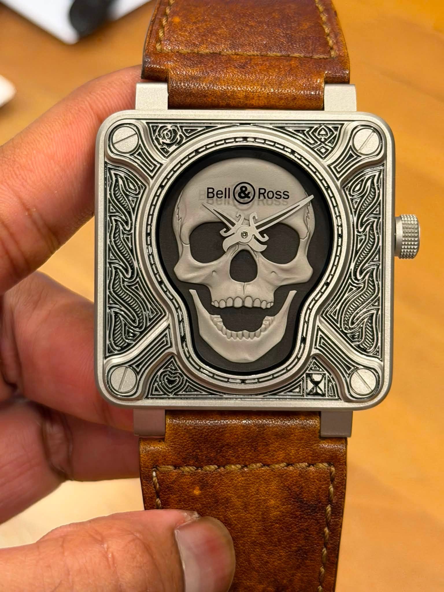May be an image of wrist watch and text
