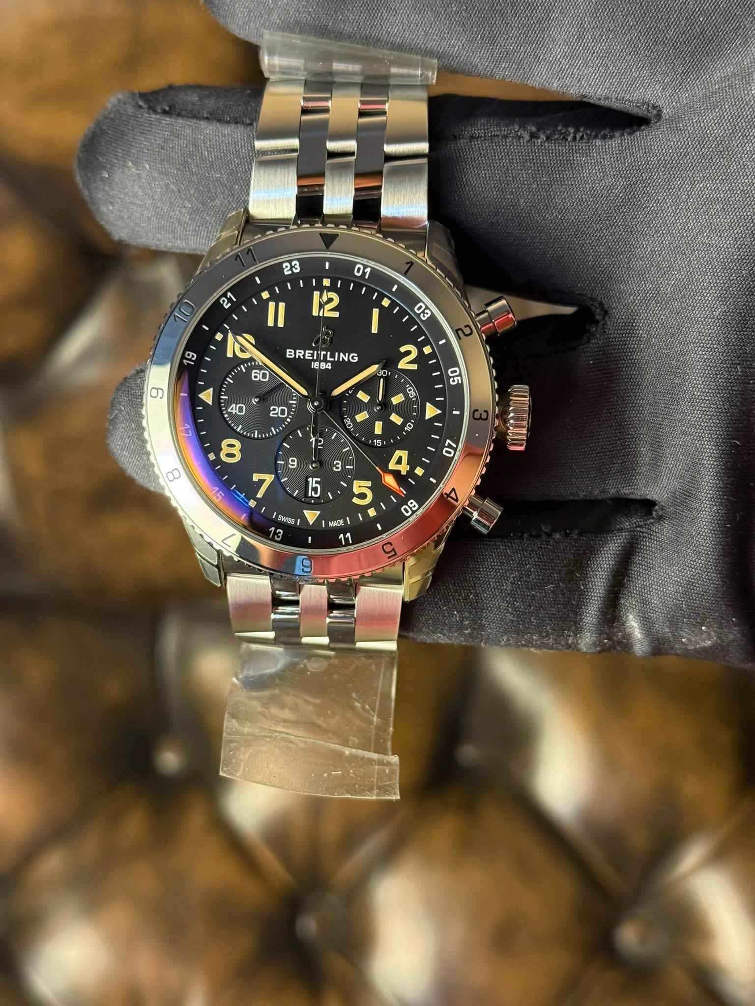 May be an image of wrist watch and text