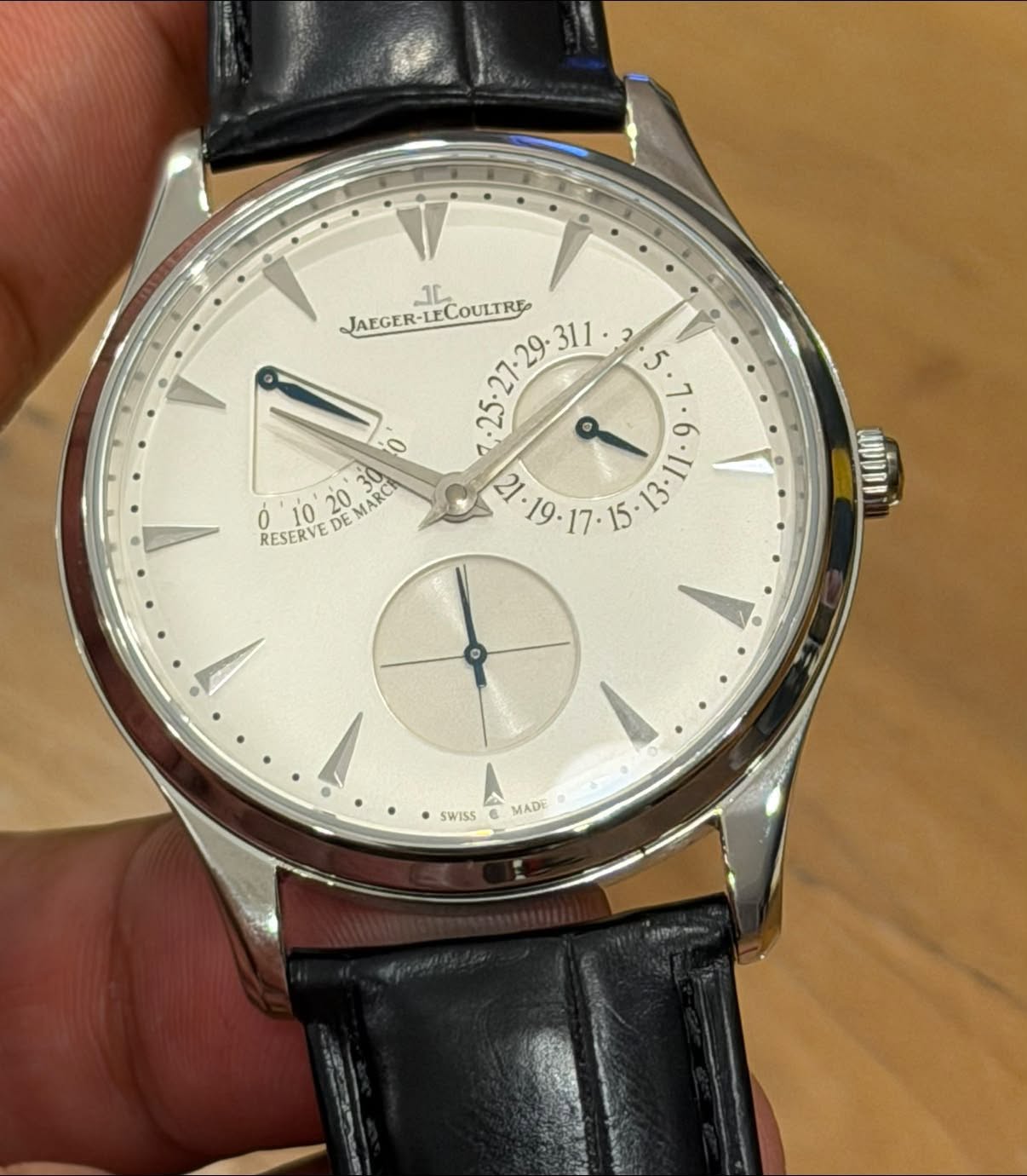 May be an image of wrist watch and text