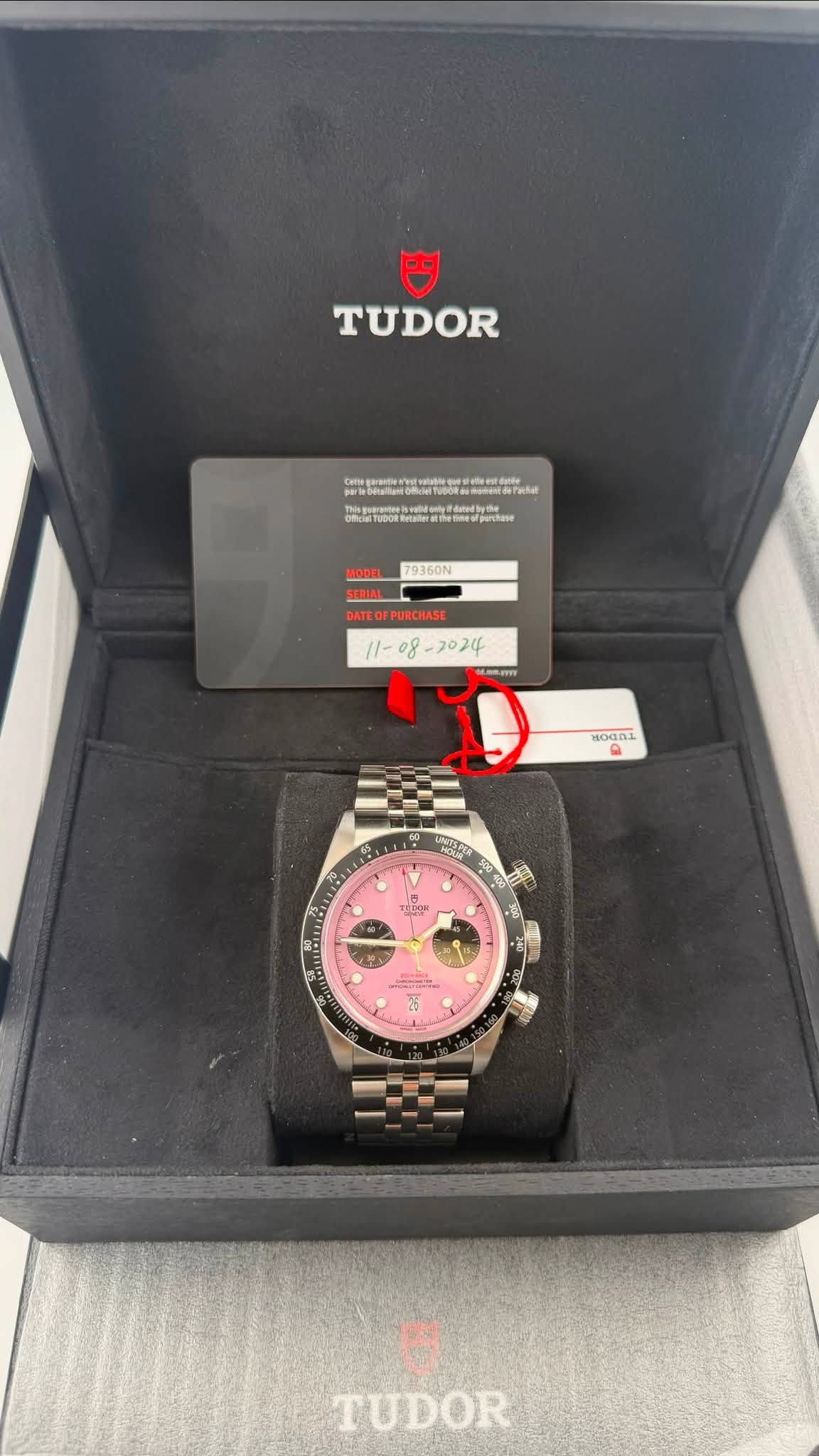 May be an image of wrist watch and text