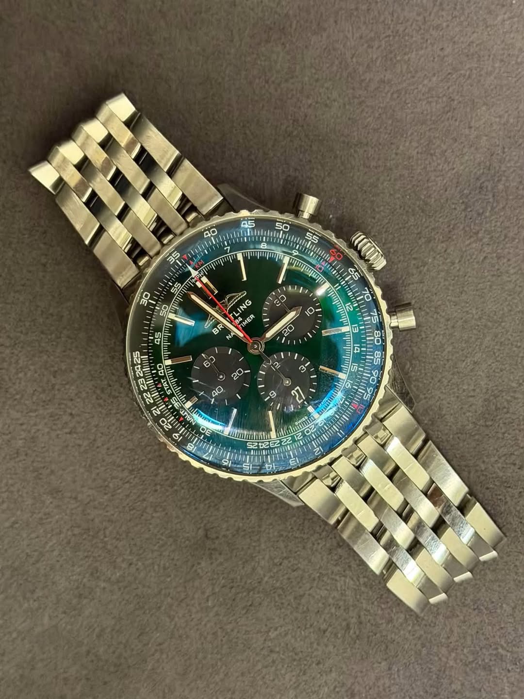 May be an image of wrist watch and text