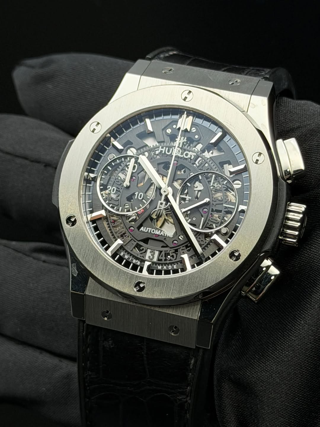 May be an image of wrist watch and text
