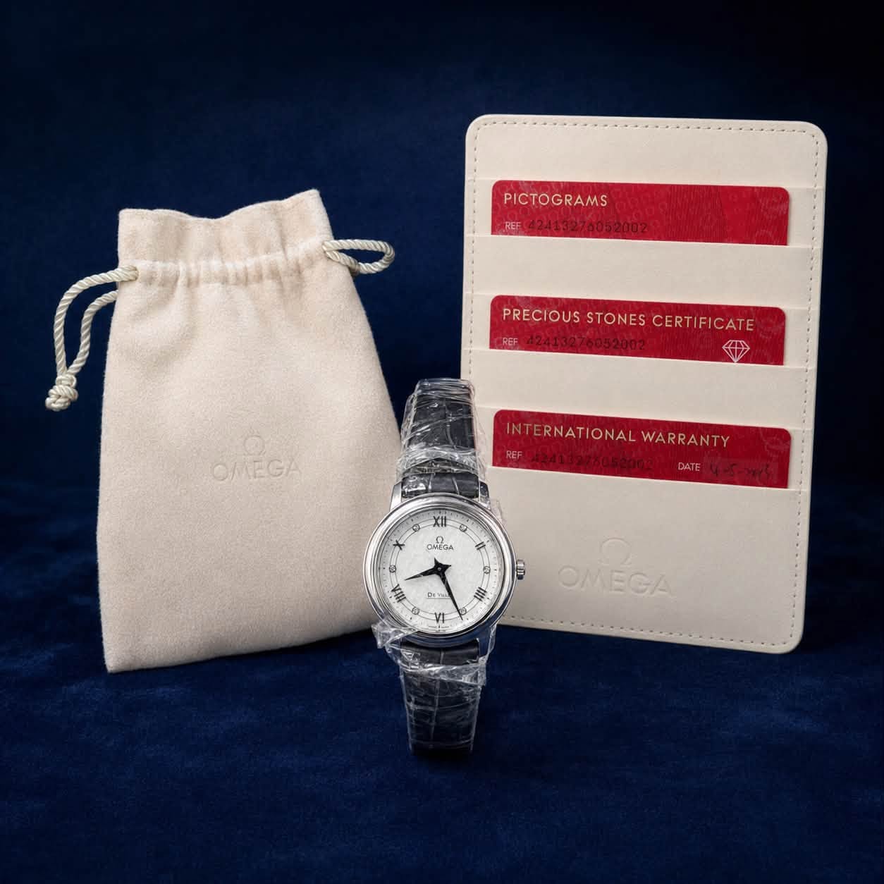 May be an image of wrist watch, leather, strap and text that says 'PICTOGRAMS RE2413274052002 PRECIOUSSTONESCERTIFICATE STONES CERTIFICATE PRECI OUS 金 OMEGA INTERNATIONAL…