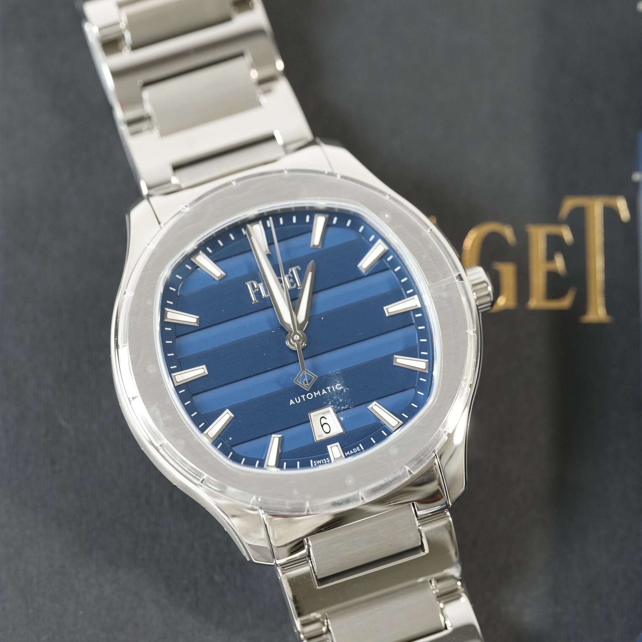 May be an image of wrist watch and text that says 'Fi ET な 1 一 SET AUT AUTOMATIC 2. 6 / のウx1 SWAS'