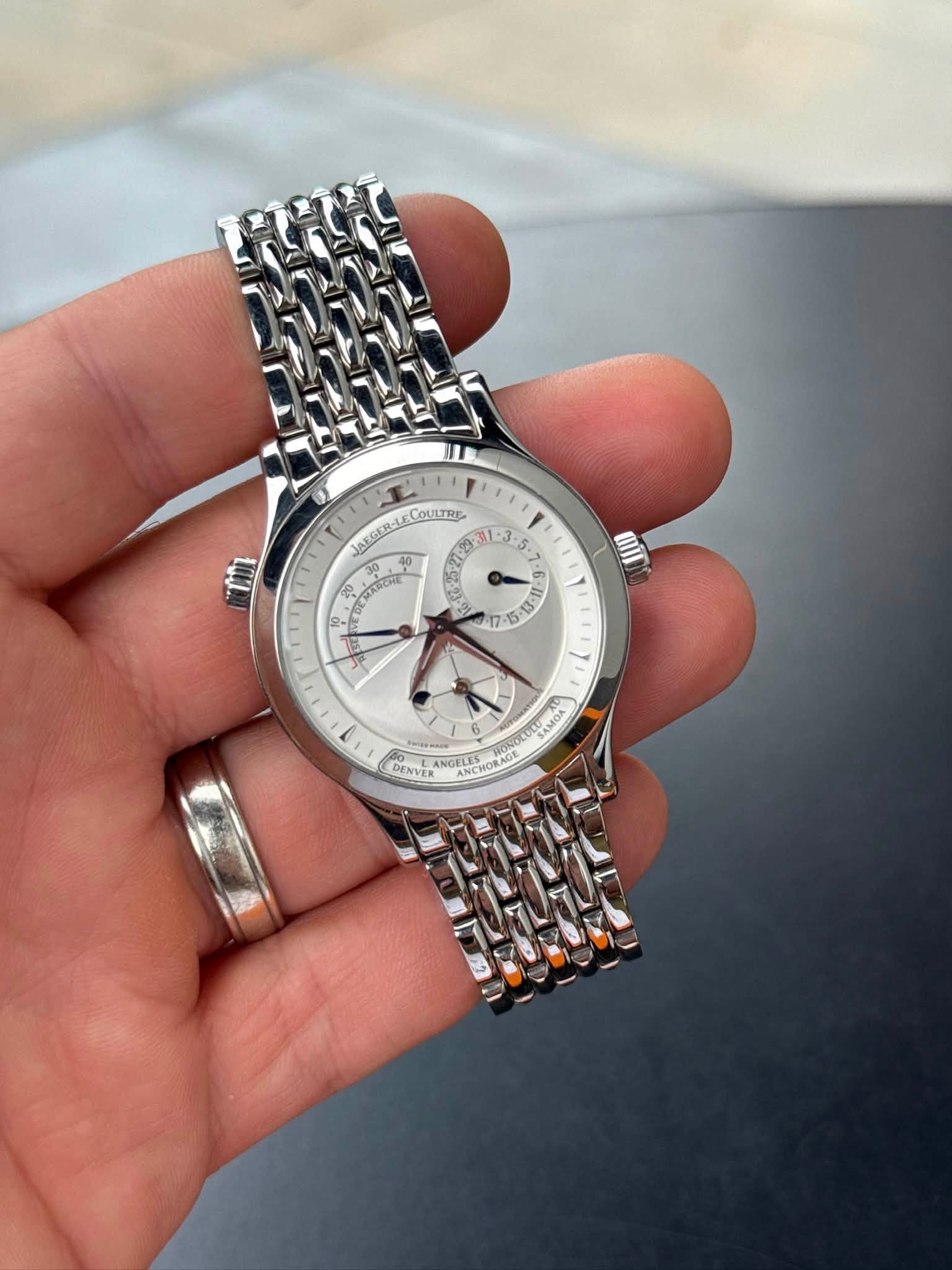 May be an image of wrist watch and text