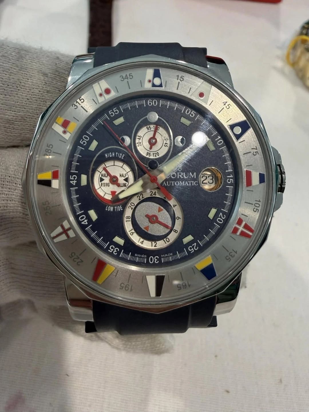 May be an image of wrist watch and text