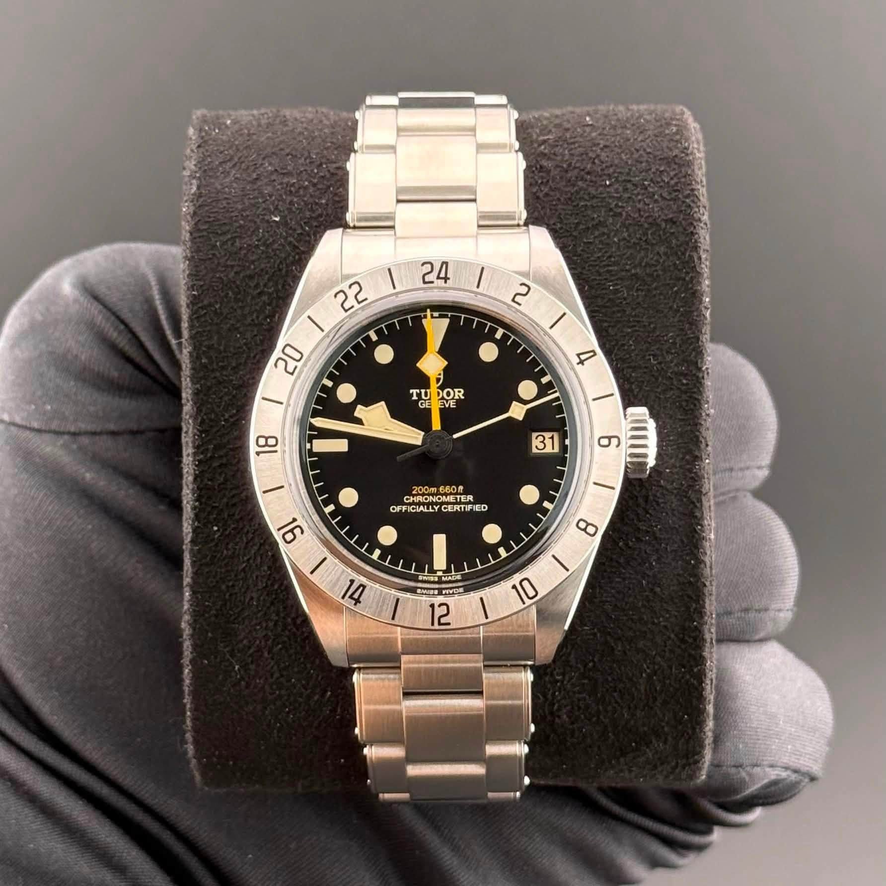 May be an image of wrist watch and text