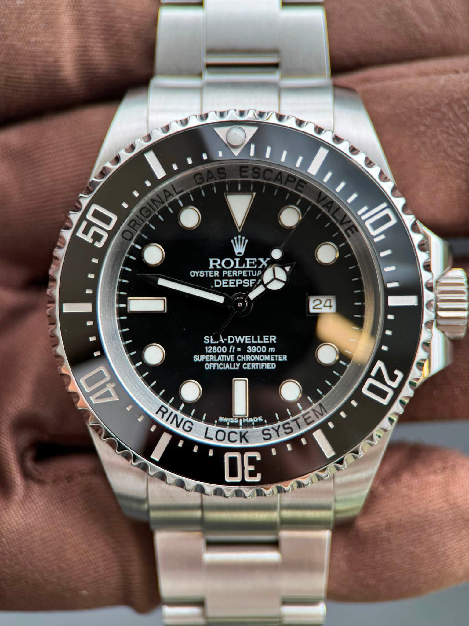 May be an image of wrist watch and text that says ' ROLEX OYSTER OYSTERPERPETUP PERPETUP DEEPSF 24 SL.A-DWELLER SL. 12800ft 3900 SUPERLATIVE SUPERLATIVECHRONOMETER CHRONOMETER…