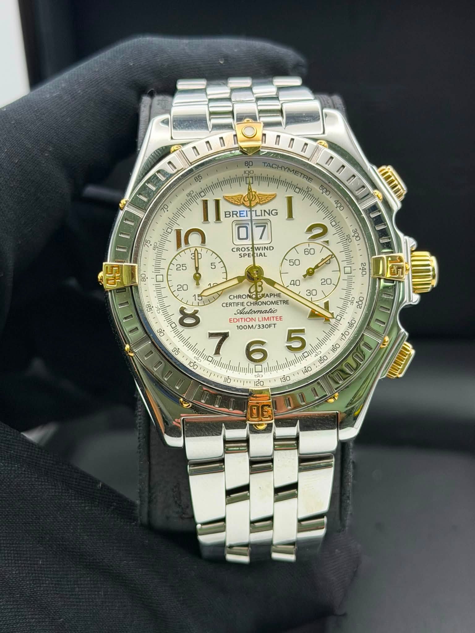 May be an image of wrist watch and text