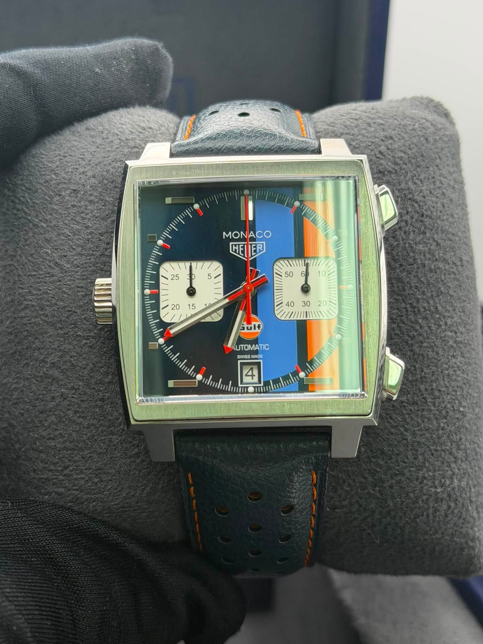 May be an image of wrist watch and text