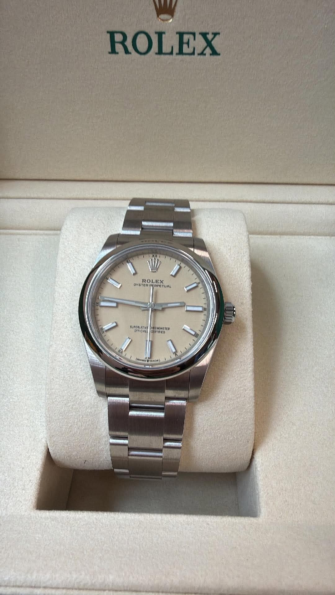 May be an image of wrist watch and text