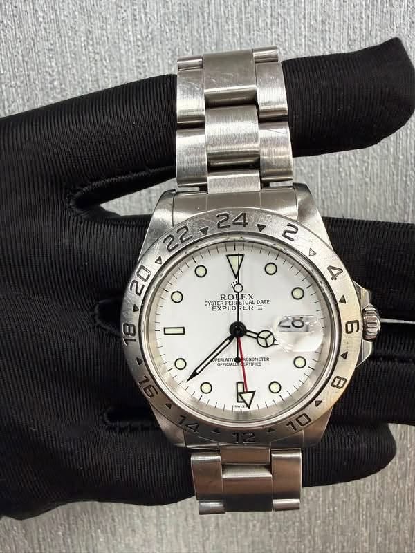 May be an image of wrist watch and text that says '22-24 1I1 O O o 4 O 2రీ AVSTERPER RO EX OYSTERP OYSTERPOLLFALDATE DATE EXPLO ER ETUAL EXPLORER DATE II 18 6 DERLATII OFFICIALLY…